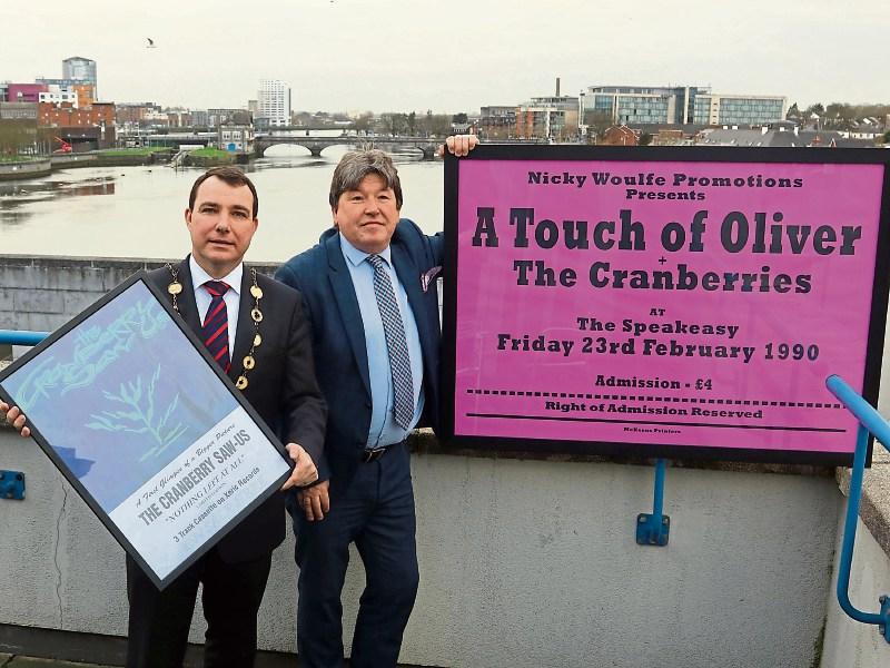 Mayor James Collins and Nicky Woulfe with some of the posters Picture Brendan Gleeson