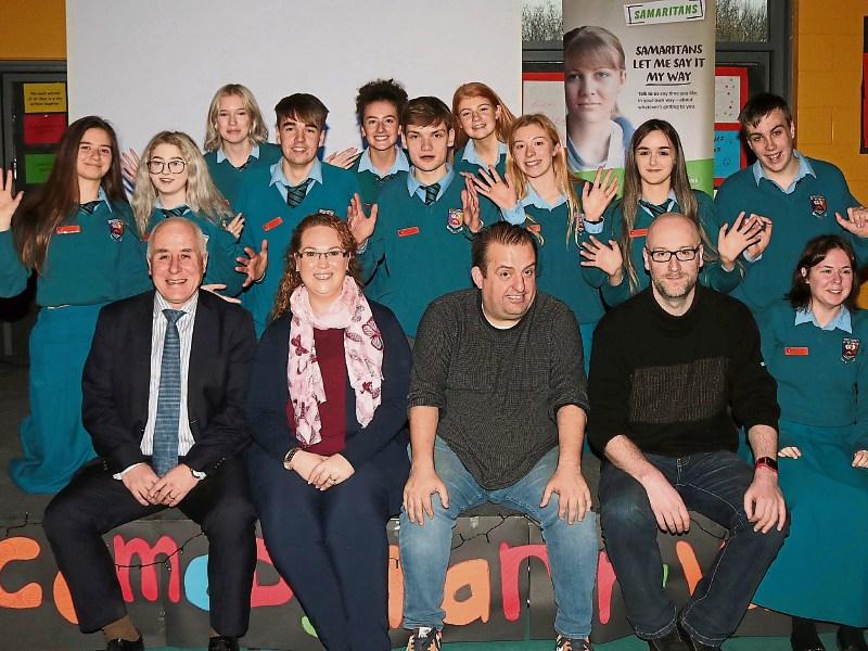 Comedian Karl Spain with students and staff at Castletroy College Picture: Michael Cowhey