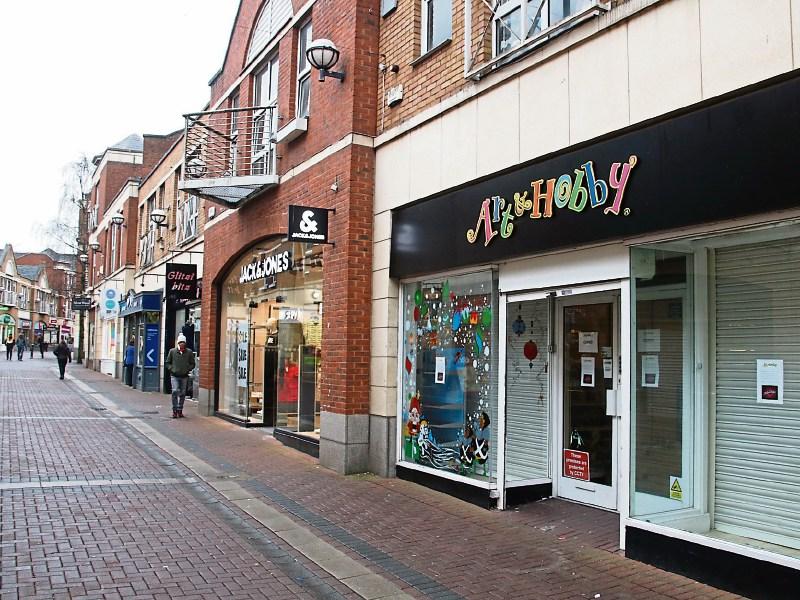 David Fitzsimons is to produce a key report on the problems facing Cruises Street and the city centre