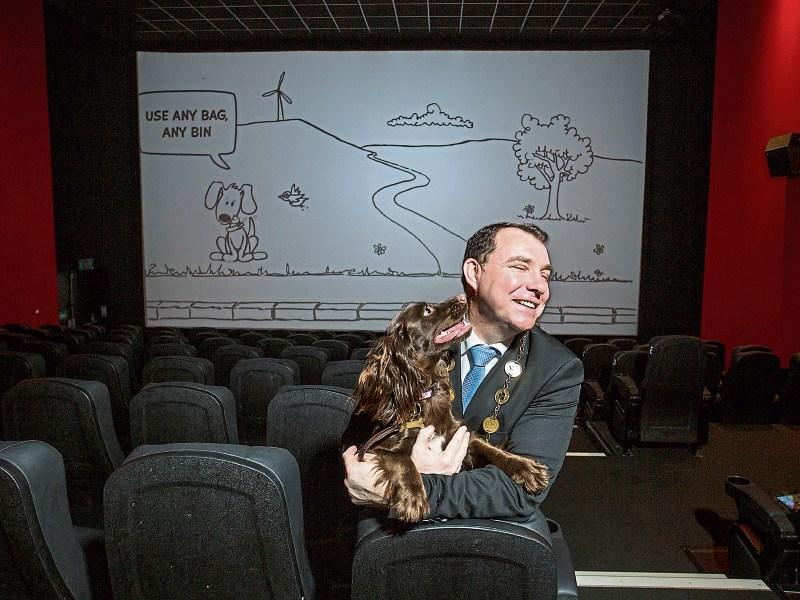 Mayor of Limerick City and County Council Cllr James Colins pictured at the Omniplex Cinema, Dooradoyle with his dog Laika to launch Dog Pooh! Picture: Alan Place