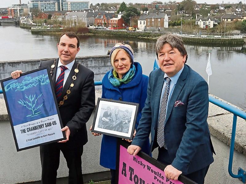 Music collector Nicky Woulfe, right, making a presentation to Mayor James Collins and Cllr Marian Hurley Picture Brendan Gleeson