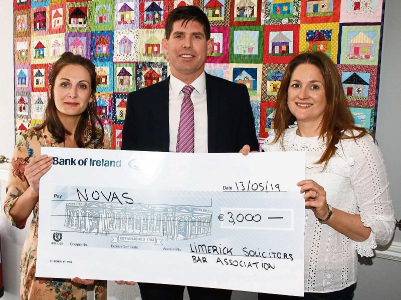 Limerick solicitors donate €3,000 to homeless charity