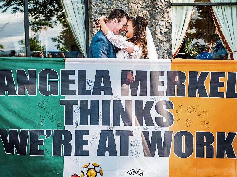 German chancellor sent a Limerick Leader by Merkel flag couple as a thank you