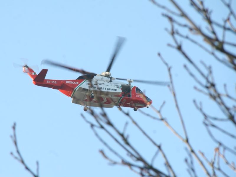 Coast Guard helicopter deployed during rescue operation at Limerick woodland
