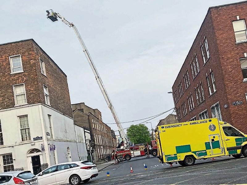 Rescue operation underway in Limerick after man 'gets stuck' on roof