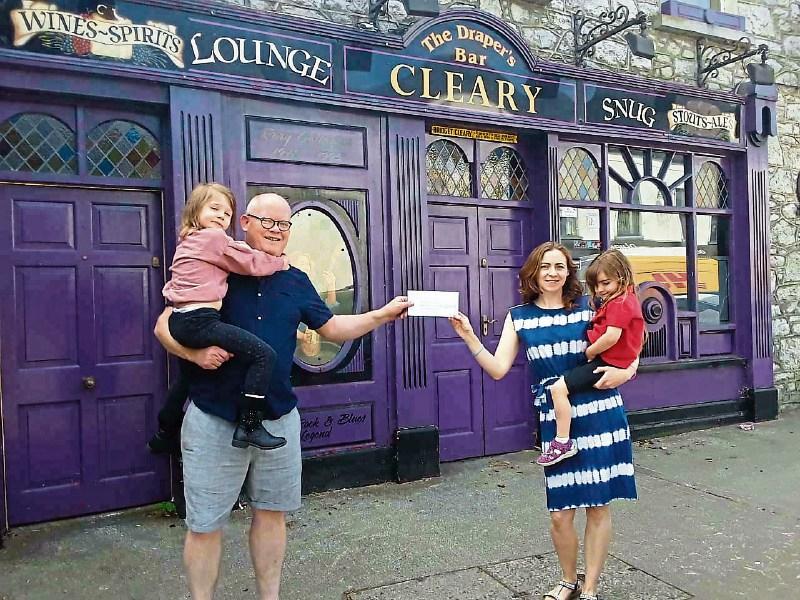 Window sessions in Limerick pub keep the music, fundraising and spirits on a high