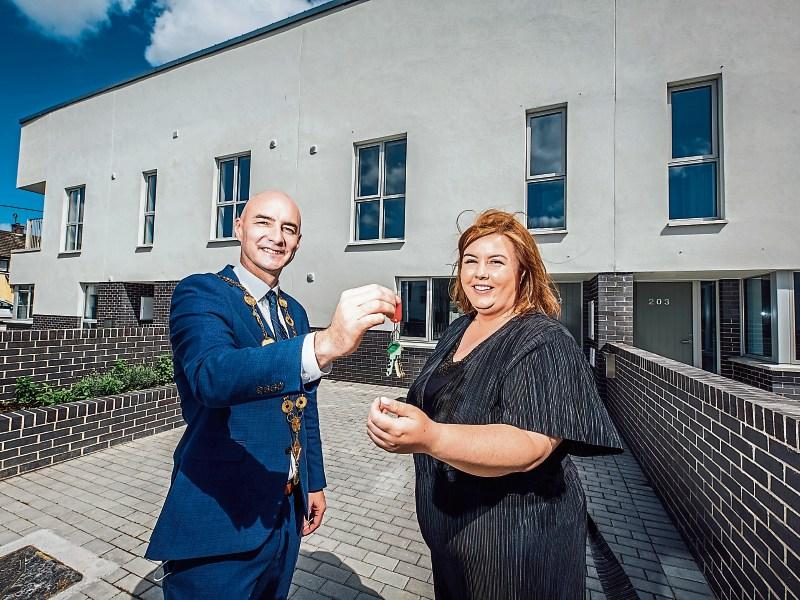 First tenants of new Limerick housing scheme get their keys Limerick Live
