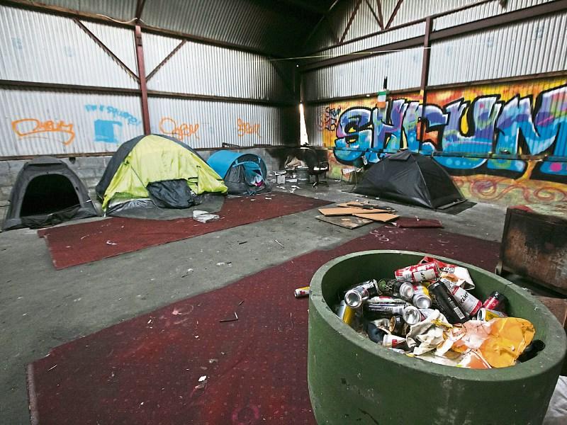 Abandoned building in Limerick houses homeless in tents