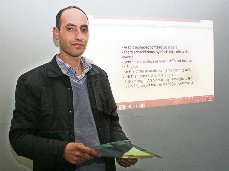 Palestinian joins Syrian refugee in giving free Arabic classes in Limerick