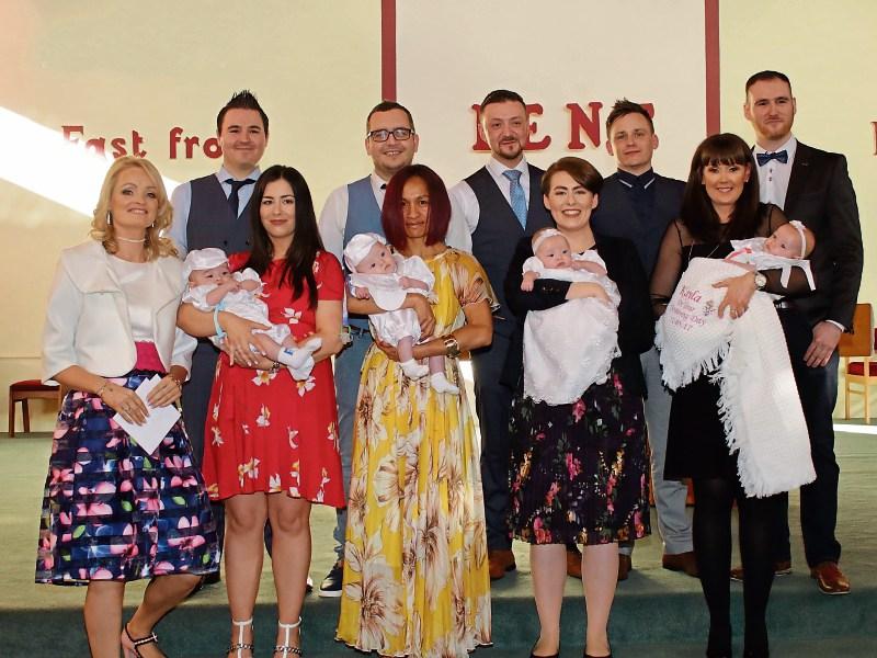 Babes in arms: Limerick quads are baptised
