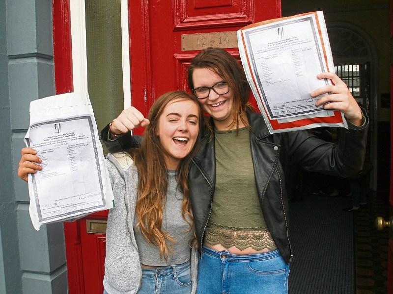 Leaving Cert results day at Limerick Tutorial College: Niamh Moran and Aisling Flaherty celebrate results Picture: Adrian Butler