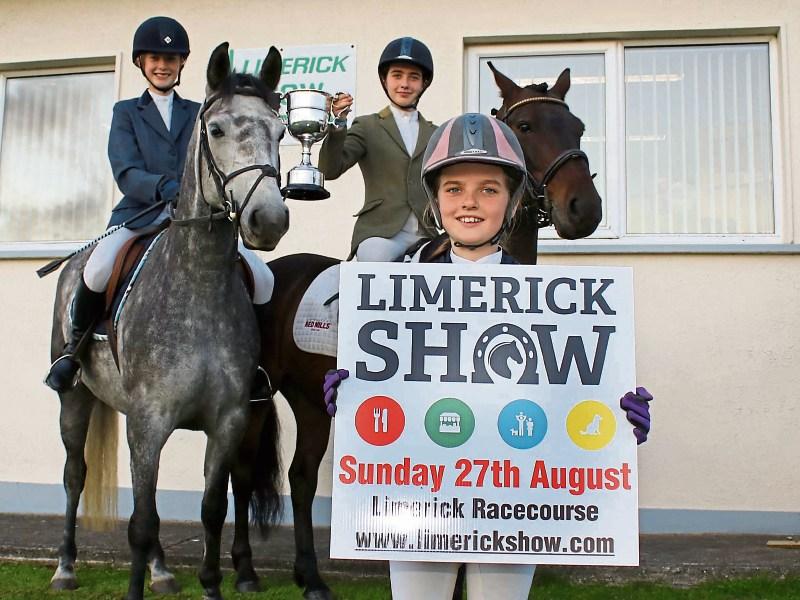 Sisters, Libby, Aisling and Denise Moran, Askeaton, can’t wait to saddle up their mounts at Limerick Show on this Sunday Picture: Michael Cowhey