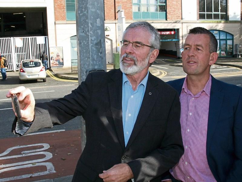 Selfie-time: Sinn Fein party president Gerry Adams captures the moment with local TD Maurice Quinlivan Picture: Adrian Butler