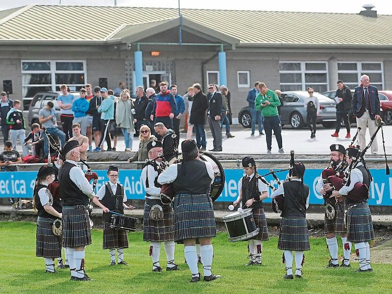 Keeping a long tradition alive: Members of Limerick Pipe Band playing before the Garryowen match against Clontarf in the All Ireland League recently Pictures: Gareth Williams