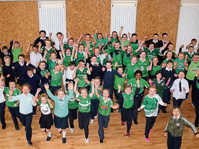 Students of Scoil Mocheallog primary school in Kilmallock showing their support for their local side in the county final at the Gaelic Grounds this Sunday Picture Michael Cowhey