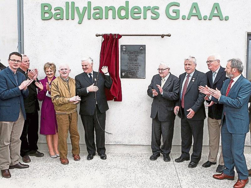 The late Bill Fox, fourth from left, pictured beside Aog&aacute;n &Oacute; Fearghail, President of the GAA unveiling a plaque to open the new Frank Basil Dineen facility at Ballylanders GAA Club last year