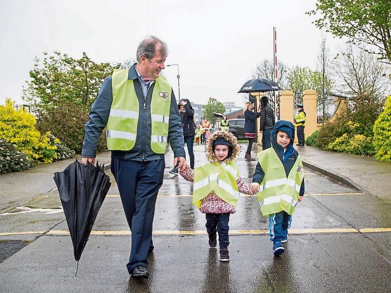 JP McManus with Sophie Glasheen and Robbie Woodland during this year's Team Limerick Clean-Up Picture: Alan Place