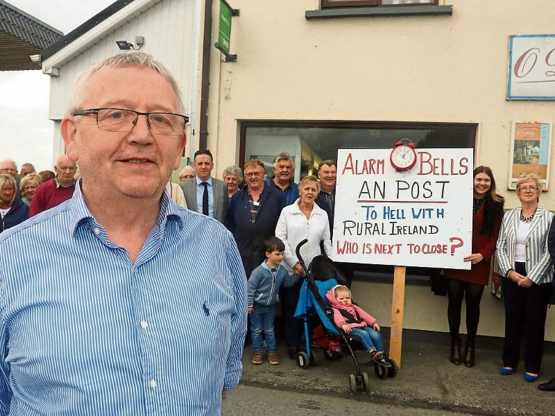 Postmaster Denis O'Dwyer at the rally in Old Pallas in September - and below, the crowds in support Pictures: Brendan Gleeson