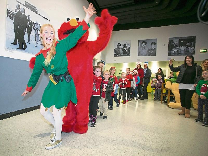 Joanna The Elf and Elmo lead the lucky ones to the Departure Gate at Shannon Airport last year Picture: Arthur Ellis