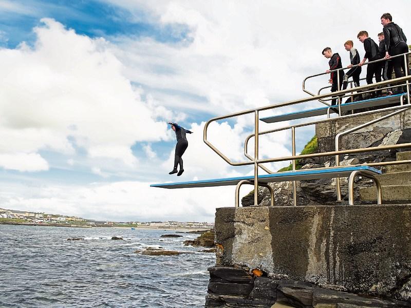 Kids having fun at the popular diving spot of Newfy in Kilkee Picture: John Kelly