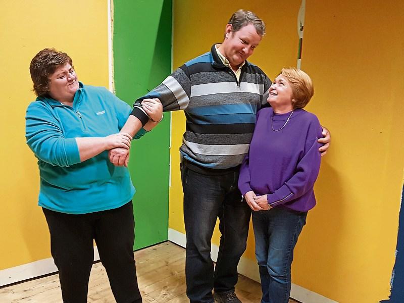 Gabriel - Donal Woulfe -  is torn between Hazel - Frances Kennedy - and Chrissie - Joan O’Connell - pictured in  rehearsals for The Two Loves of Gabriel Foley