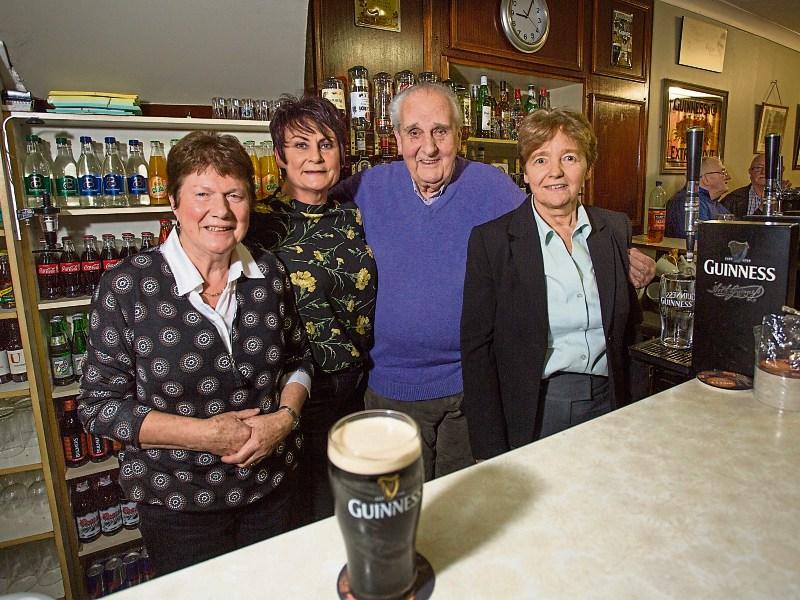 Ned Lynch pictured with staff members Mary Sheehy, Marie Moloney and his daughter Claire at the 100th anniversary of Lynch’s pub in Newcastle West Picture: Marie Keating