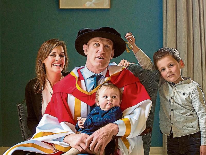 Paul and Emily pictured in UL in 2015 with Lola and Paddy, on the occasion of the rugby legend receiving an honorary doctorate Picture: Alan Place