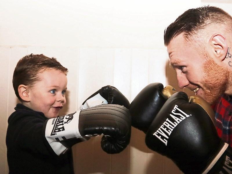 Graham McCormack spars with proud son Dylan, 2, ahead of his professional debut in Dublin this Saturday Picture: Brendan Gleeson