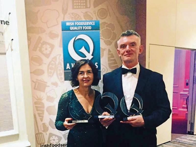 Hands full: Fiona Madigan and Garrett Landers 