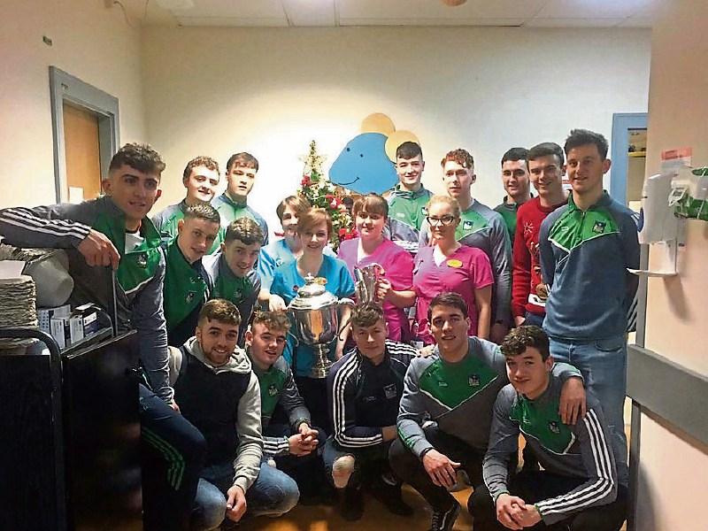 Members of the All-Ireland winning Limerick U-21 hurling team who visited the Ark unit at UHL