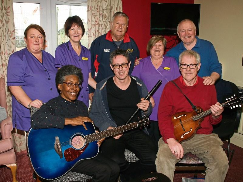 Volunteer musicians with staff at the Alzheimers Society Day Care Centre, Garryowen