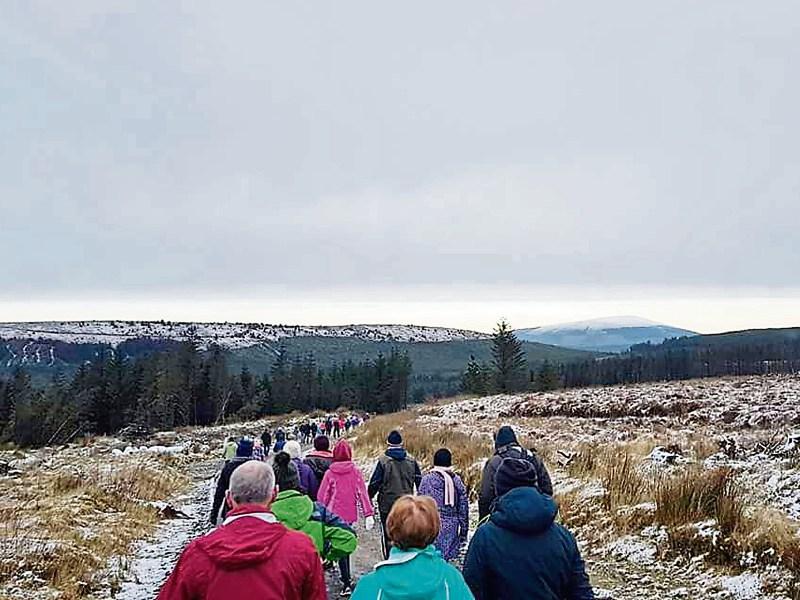 On the march: Walkers were well wrapped up on St Stephen’s Day