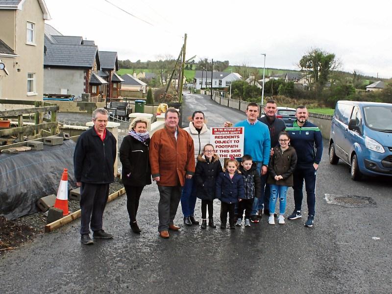 Tim Long, Mary O’Neill, Richard Harty, Tracy Harty, Billy Harty, Tim Harty and Michael Harty argue the footpath should be on the left so children from houses don’t have to cross the road