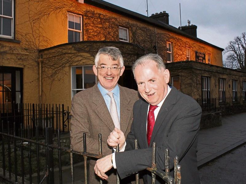 John Shovlin, right, with Louis Murphy of the Dunraven Arms outside the hotel Picture: Michael Cowhey