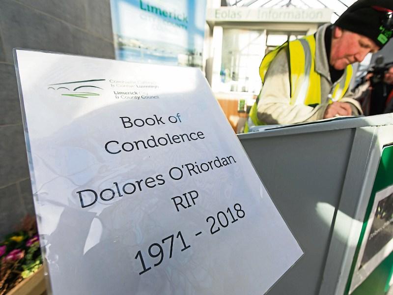 A Book of Condolence opened for Dolores O'Riordan as Limerick pays tribute to the Cranberries singer and below, Laurel Hill principal Aedin ni Bhriain and pupils Picture: Oisin McHugh