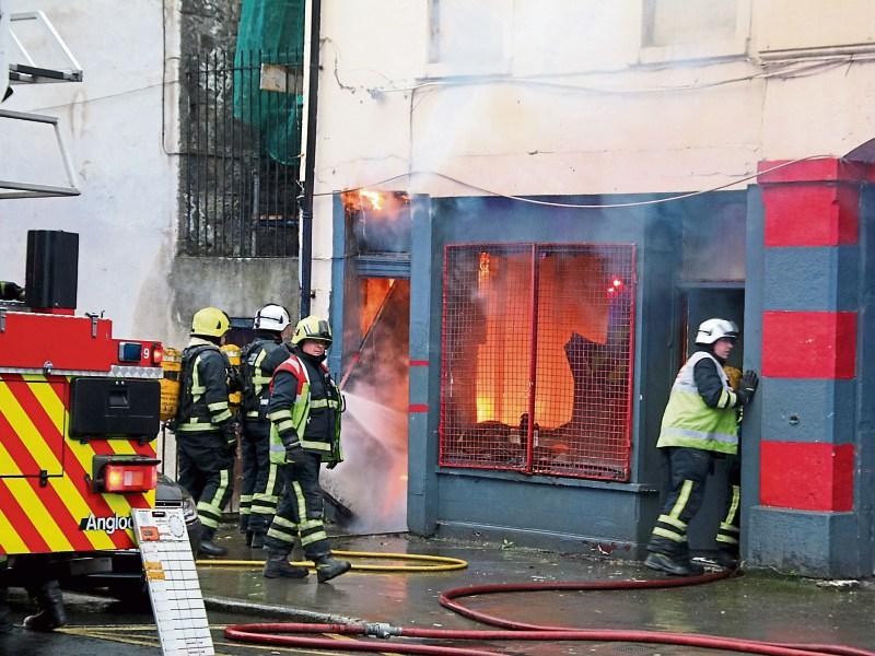 WATCH: Limerick fire fighters tackle building engulfed in flames