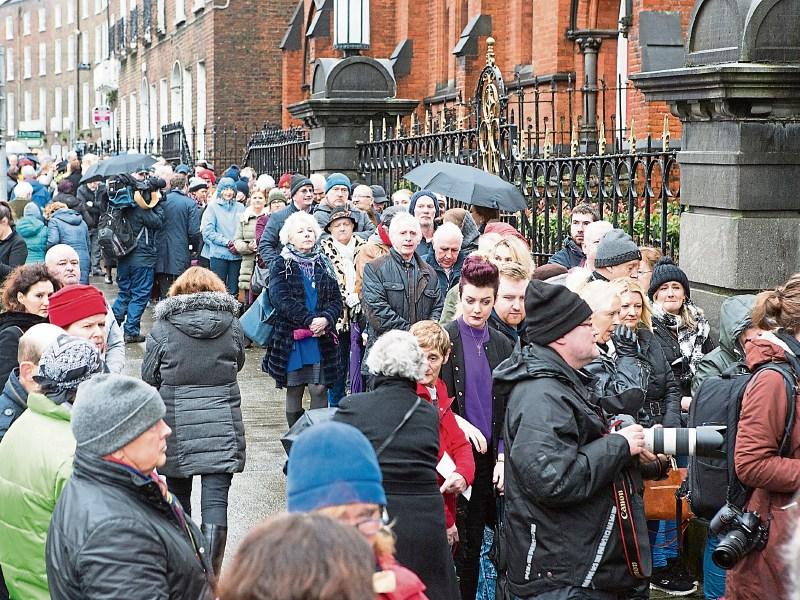 Crowds outside St Joseph's Church in the city on Sunday for Dolores O'Riordan's reposal Picture: Press 22