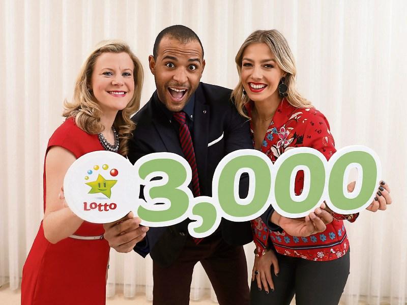 Limerick Lotto presenter Kamal Ibrahim, centre, with fellow presenters Bl&aacute;thnaid Treacy and Nuala Carey ahead of the milestone 3,000th draw Picture: Mac Innes Photography