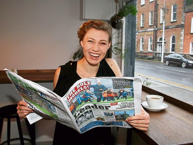 The Leader: UL student Chelsea Clockner gets a sneak preview of our new free newspaper in Rift Cafe on Mallow Street Picture: Adrian Butler