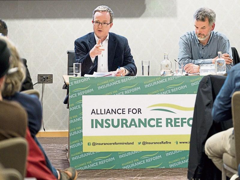 Peter Boland and Eoin McCambridge of the Alliance for Insurance Reform pictured at the public meeting at the Strand Hotel Picture: Don Moloney