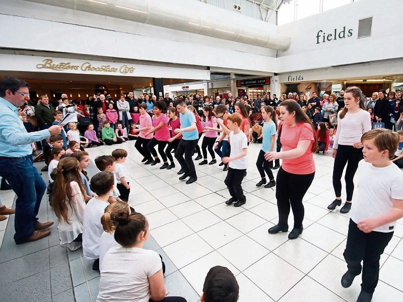 The Sean Nós flash mob organised by Bohermore NS and Pat O’Dea in the Crescent  Picture: Brendan Gleeson