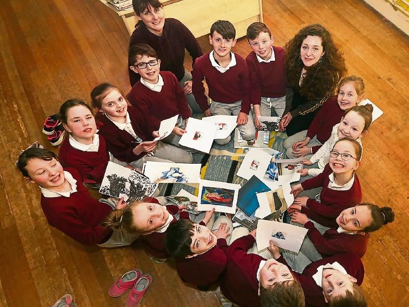 Third and fourth class students of Scoil Íde Naofa, National School, in Raheenagh, Ballagh with artists Mary Conroy and Clare Breen