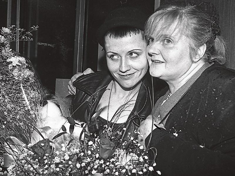 Eileen O’Riordan with her late daughter Dolores in Shannon Airport in 1991. Below, the shrine in Ballybricken church dedicated to the star Pictures: Limerick Leader