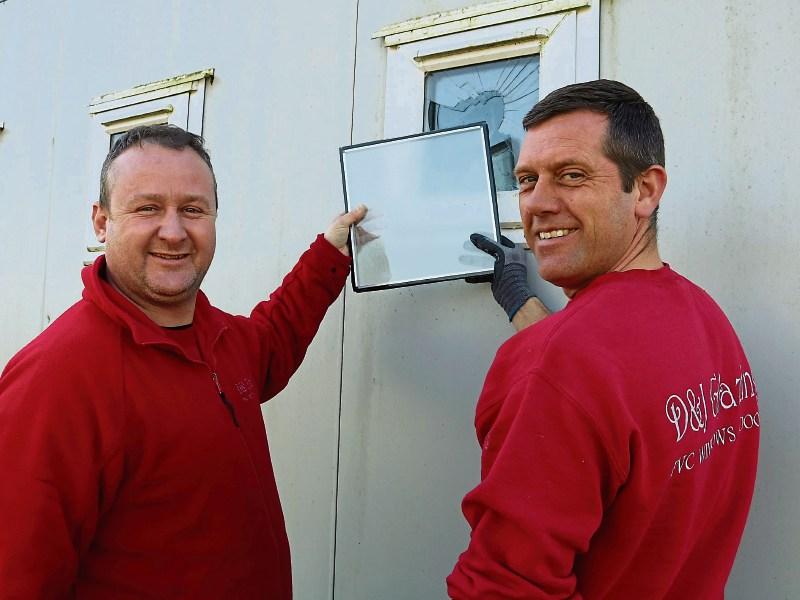 Christian Meehan and Shane Kelly of D&J Glazing which stepped in to repair the windows of Moyross United soccer club following the vandalism highlighted in this newspaper Picture: Michael Cowhey