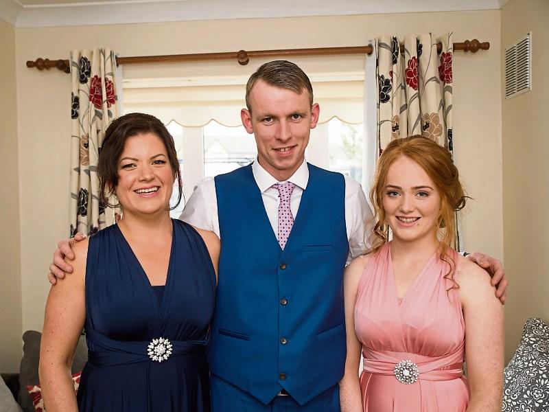 Sarah McInerney, pictured with her partner Jody and daughter Eva, 15