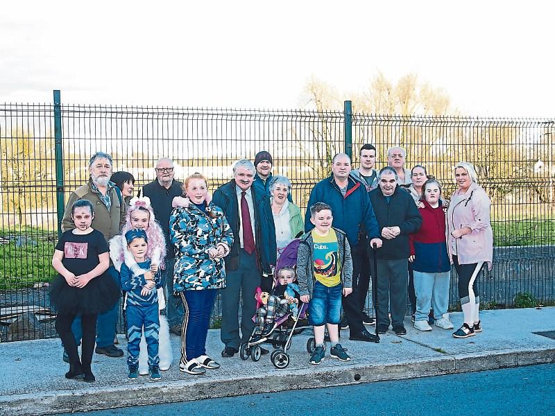 Residents of the Thomondgate New Road, pictured at the empty site, which they want converted into a nature park Picture: Michael Cowhey