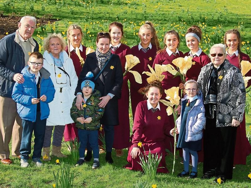 Daffodil Day Committee members Bertie Lynch and Frances Hourigan, volunteer Niamh Keating, and Maura O'Flaherty with Aodh, Cuan and Lua Keating, transition year students from Laurel Hill