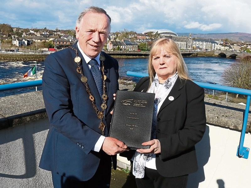 Mayor Stephen Keary with Eileen O’Riordan and below, with family members Pictures: Adrian Butler