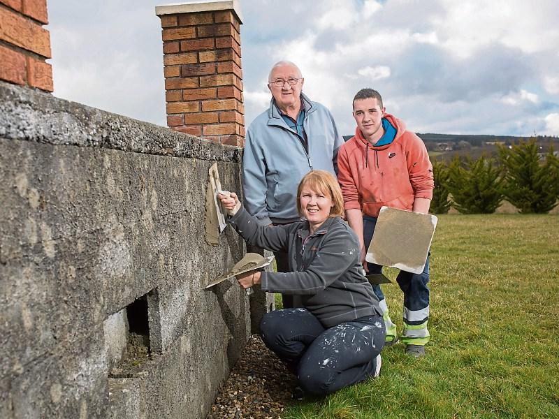 Showing how it&rsquo;s done: Patricia Brouder with her dad, Jim Ahern, and her son Raymond. Plastering runs to a seventh generation in the family Picture: Marie Keating