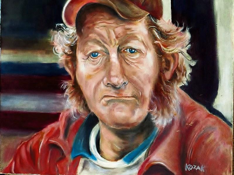 The painting by artist Jim Kozak of a man in Limerick